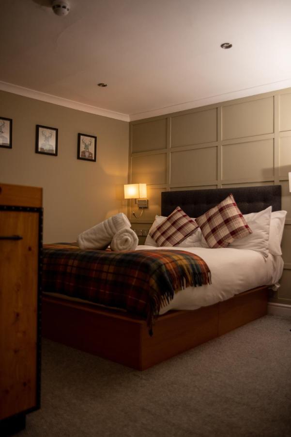 The Oak House Hotel Axbridge ภายนอก รูปภาพ A bedroom at the hotel